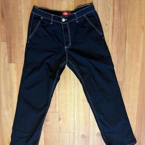 Black dickies with white exposed stitching